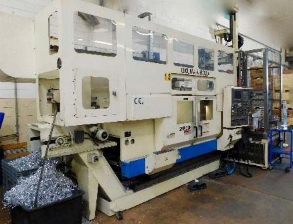 Tornio bimandrino frontale  OKUMA 2SP 30 - Foto integrale macchina 
