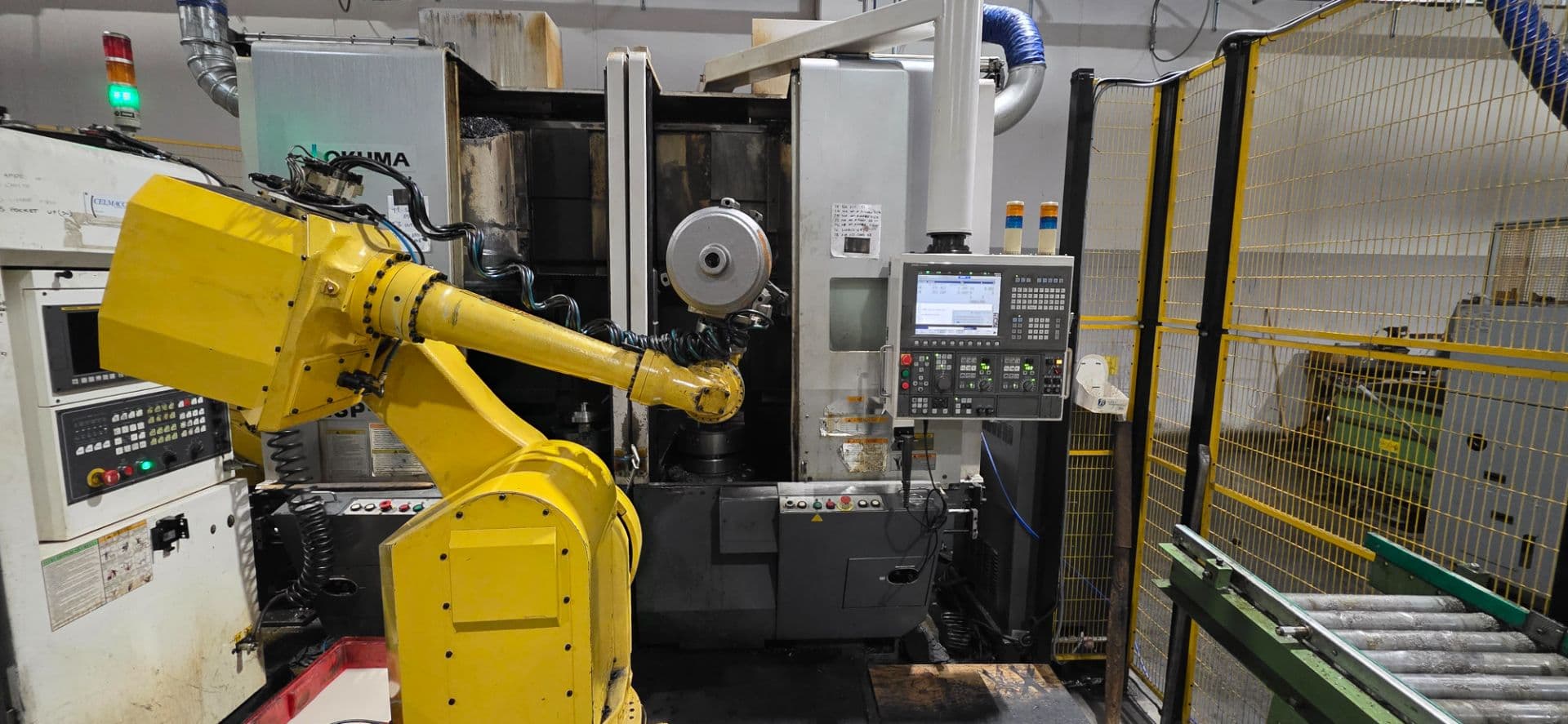 Tornio Verticale bimandrino con robot