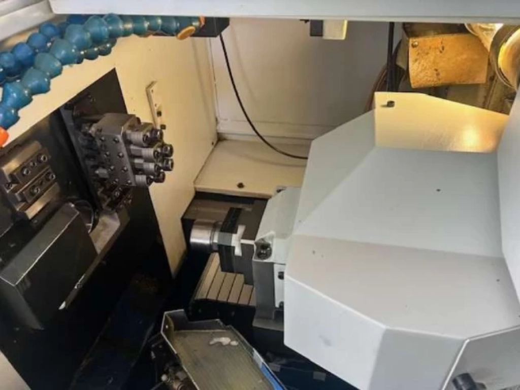 Tornio A Fantina Mobile Tornos Delta 20/4 Work area photo 